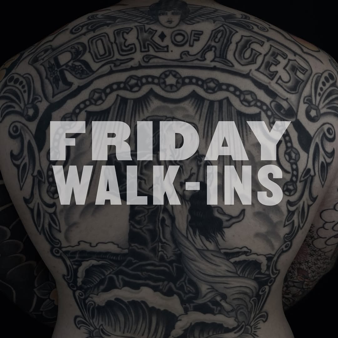 Bold black-and-gray back piece with ornate scrollwork