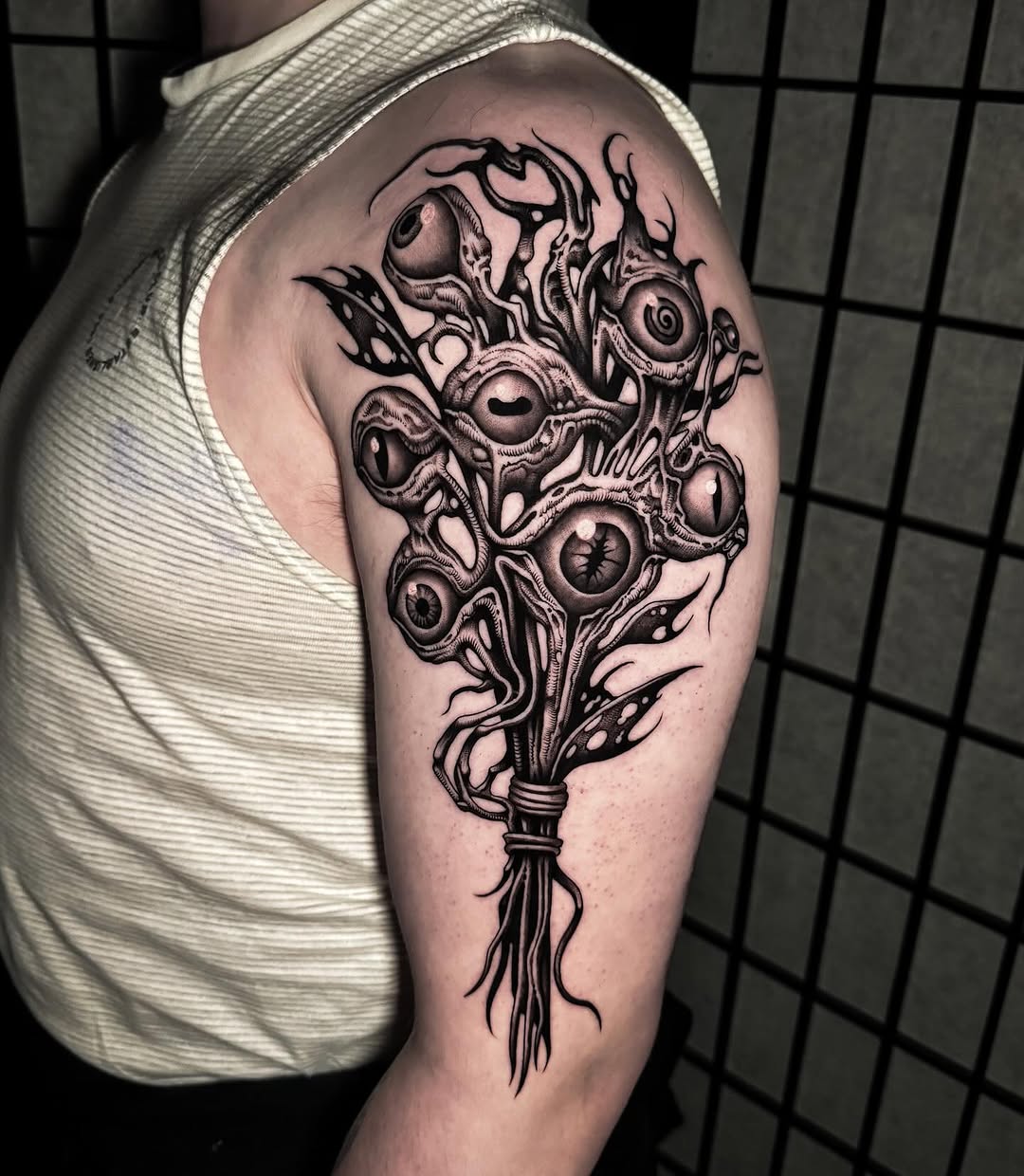 Surreal eyeball bouquet with twisting stems in bold linework