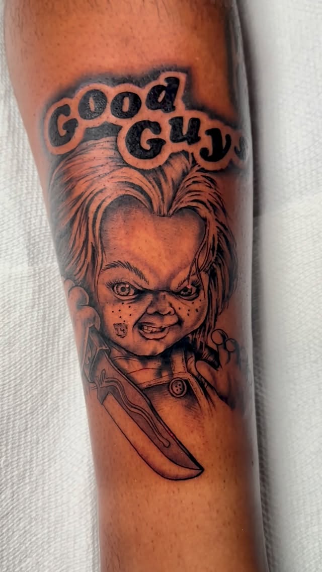 Chucky-inspired Good Guys doll with menacing grin, knife