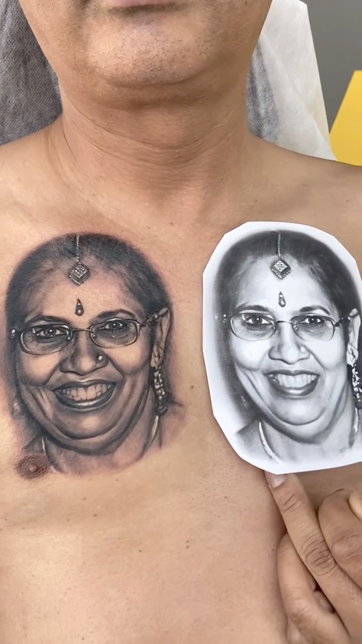 Hyper detailed grayscale memorial woman portrait on the chest