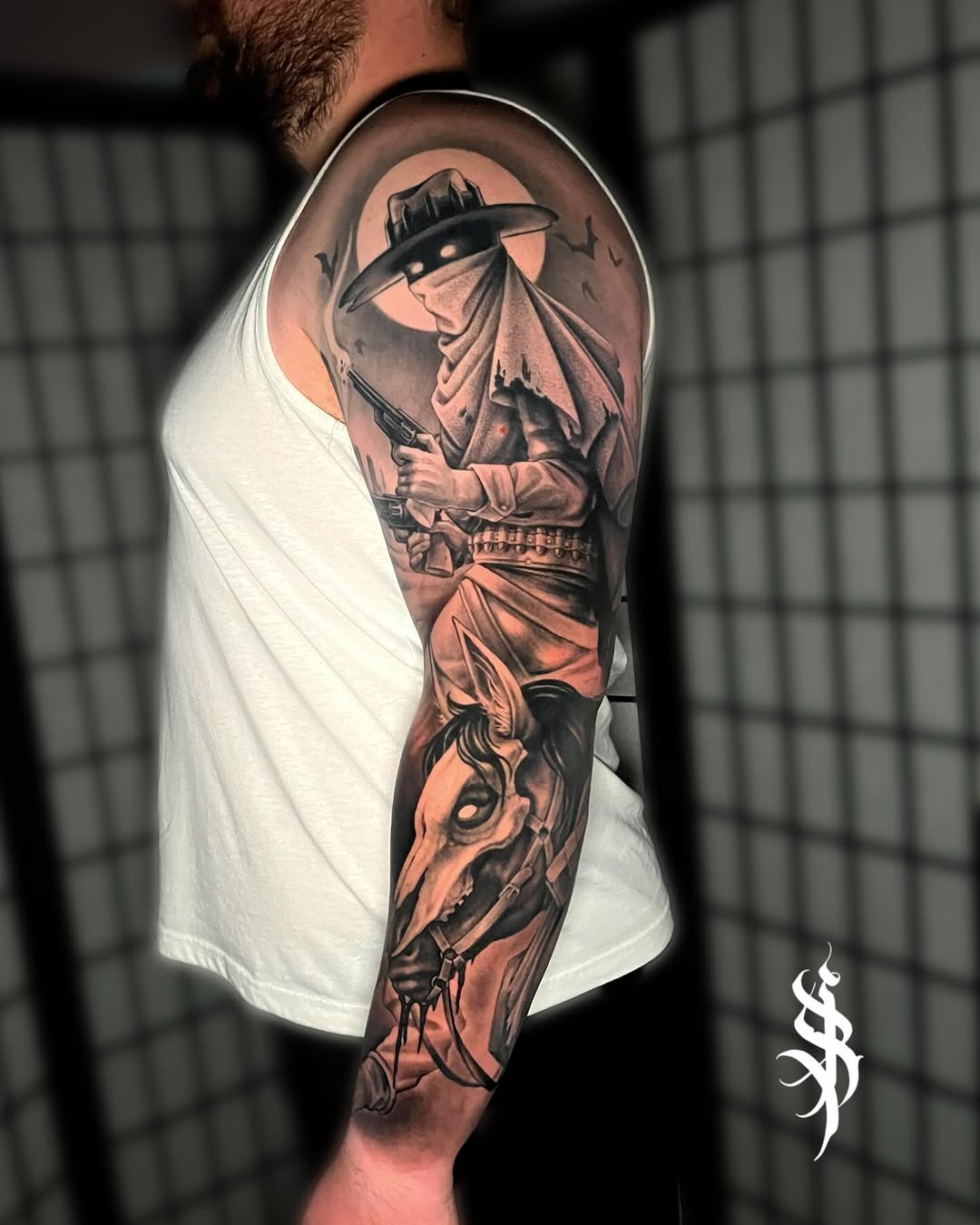 Moonlit occult cowboy silhouette with hood, revolver, and horse skull.