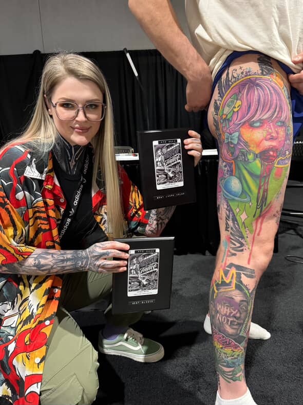 Vibrant neo-traditional leg sleeve with bold portrait.