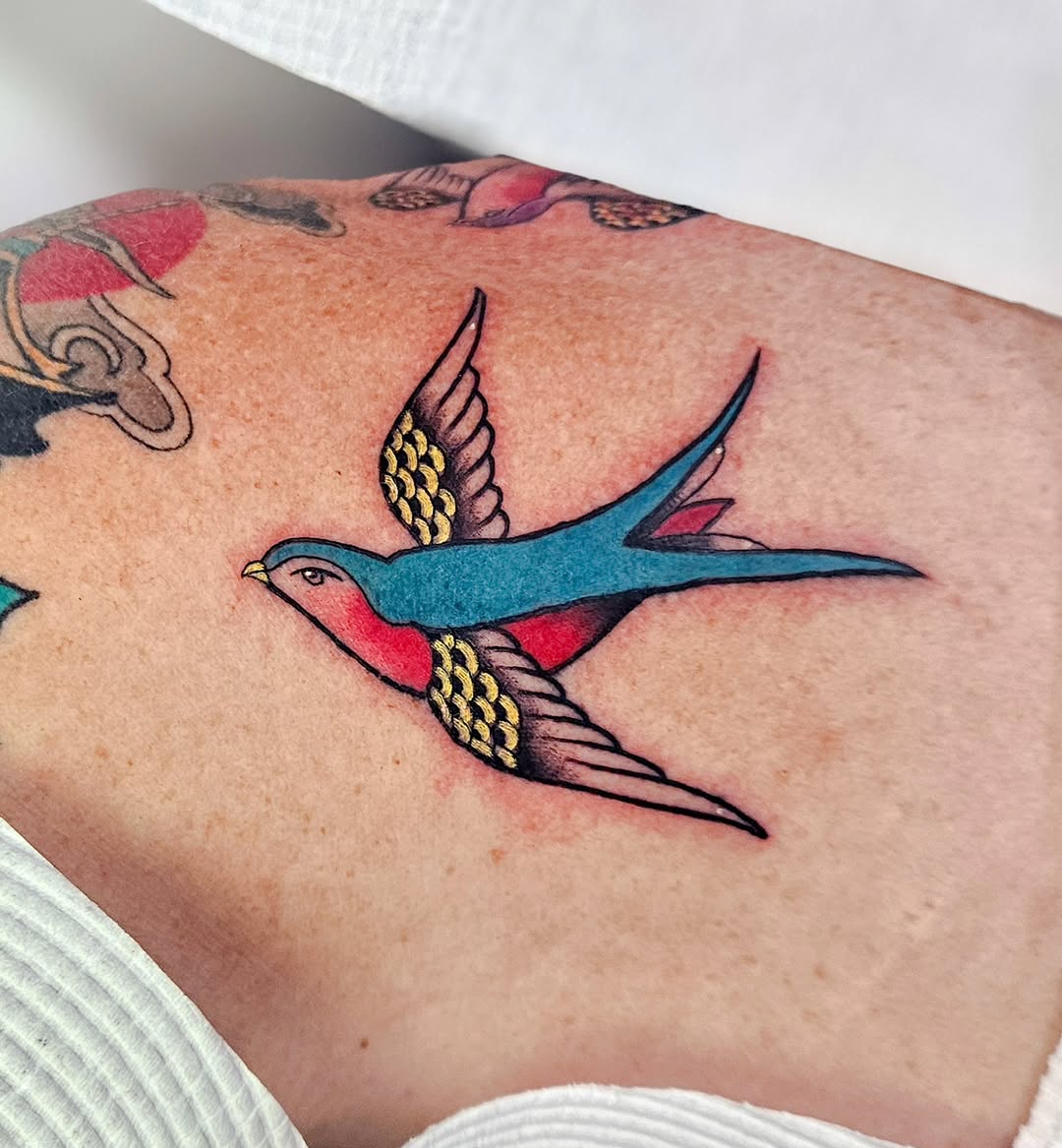 Bold swallow in traditional, vivid color palette