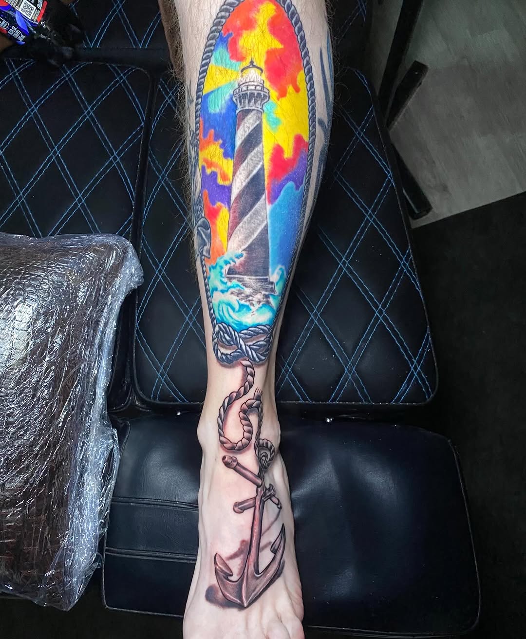 Vivid nautical leg sleeve with lighthouse, waves, anchor