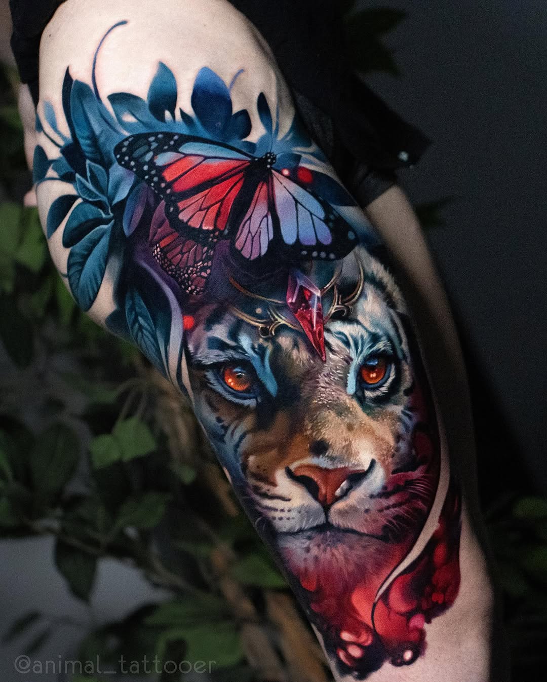 Vibrant tiger portrait with luminous butterfly overlay