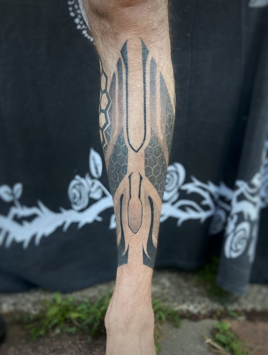 Monolithic geometric forearm piece with hex honeycomb panels