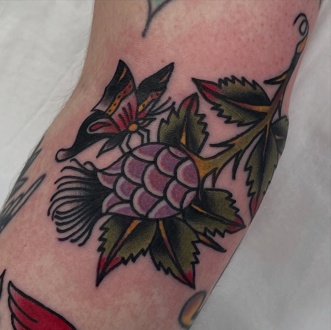 Bold neo-traditional koi with purple scales and leaves