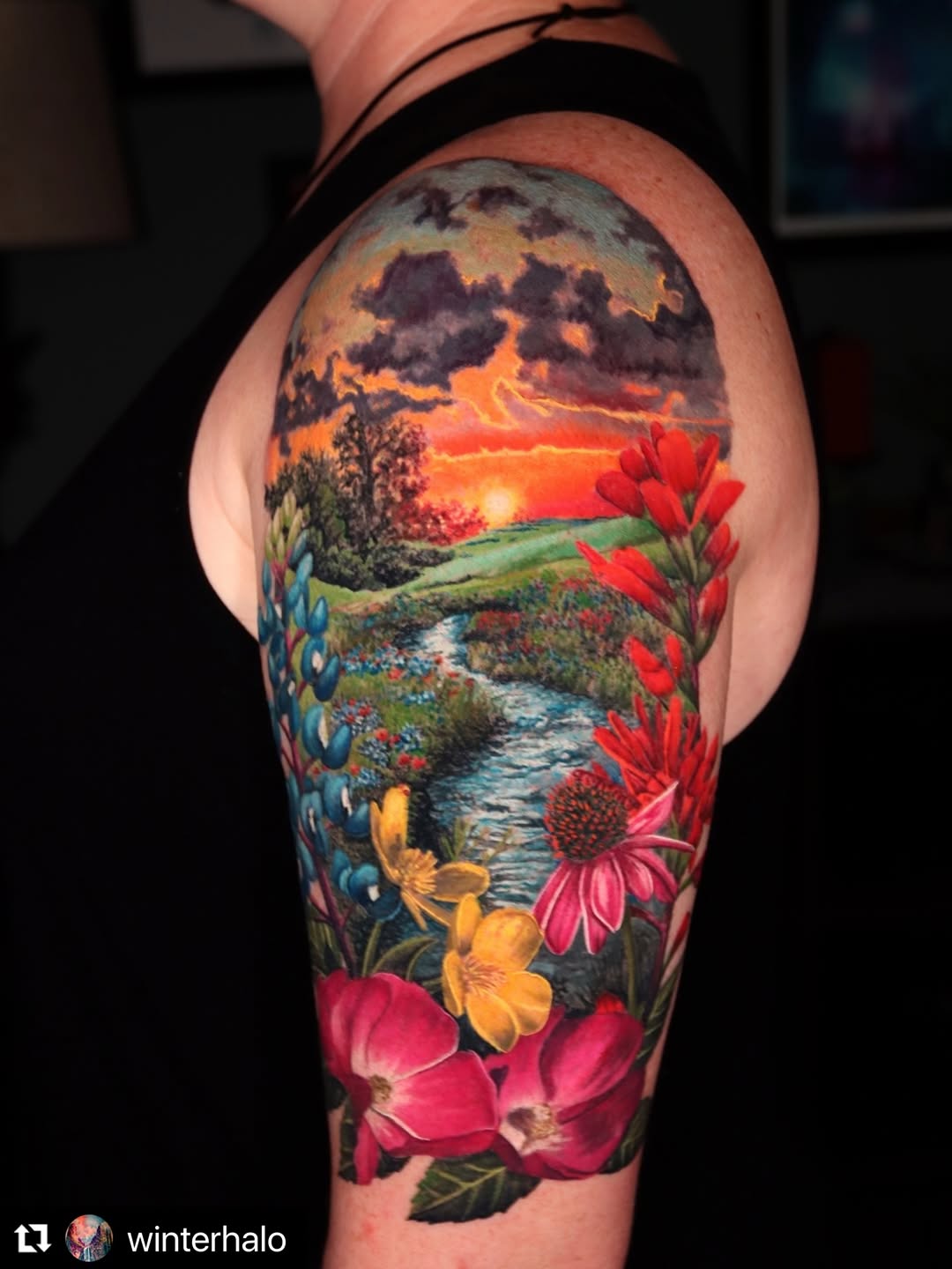 Vibrant landscape half-sleeve with sunset, river and tropical flowers