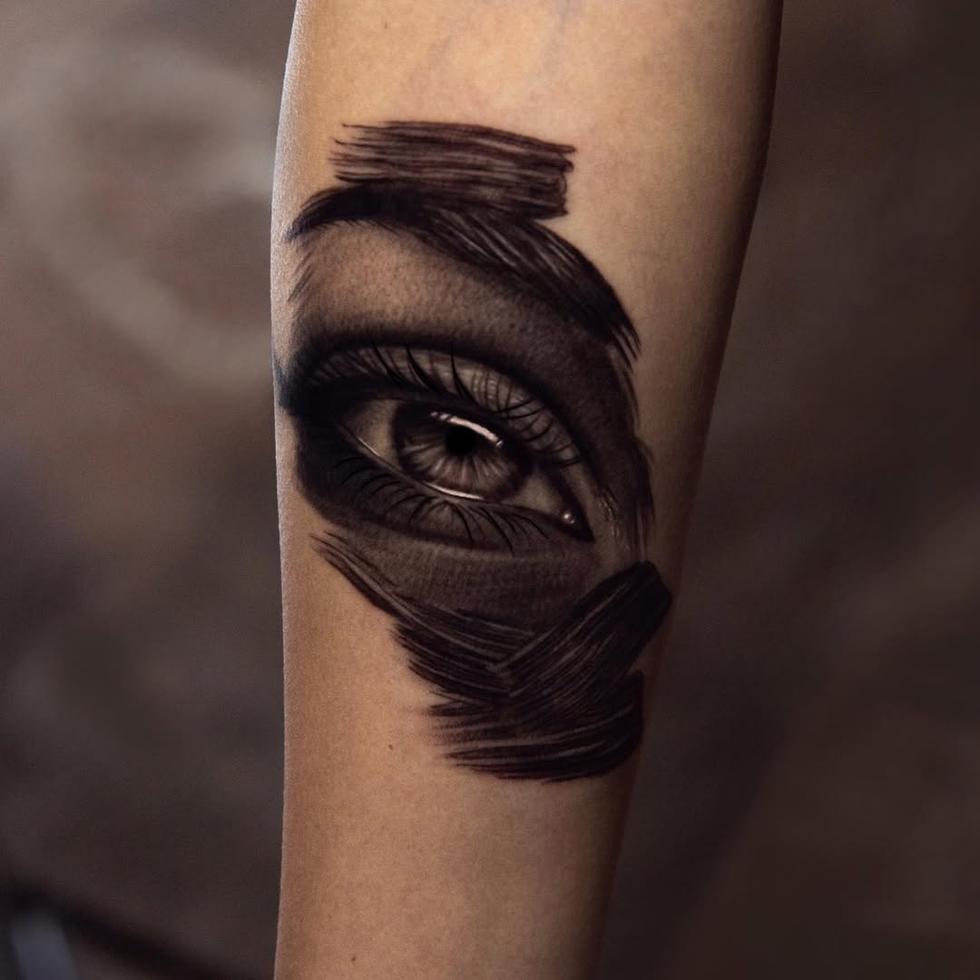 Monochrome eye portrait framed by bold brushstrokes