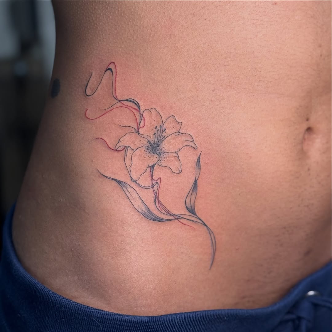 Delicate lily linework with trailing red wisps