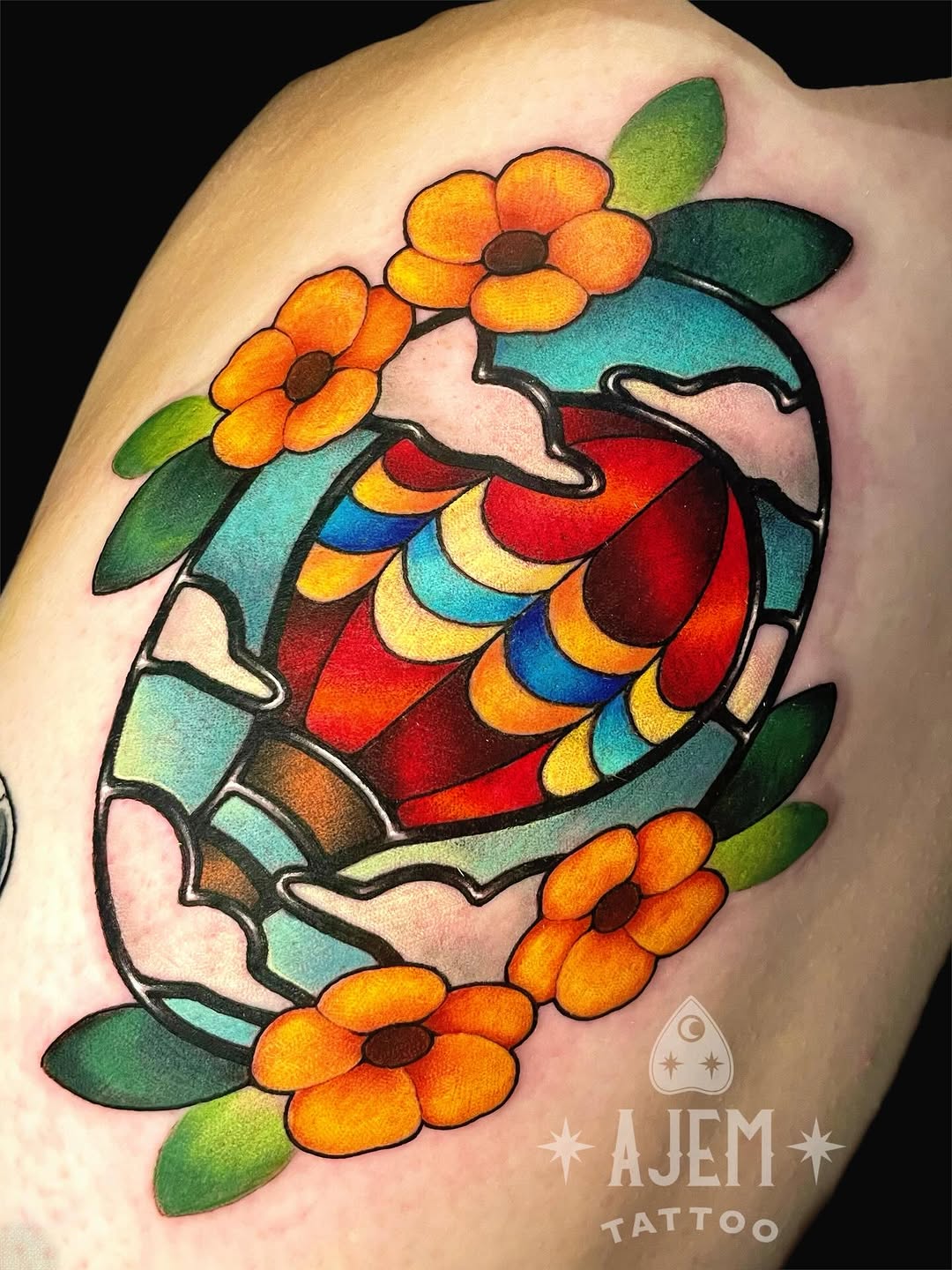 Vivid stained-glass hot-air balloon with flowers