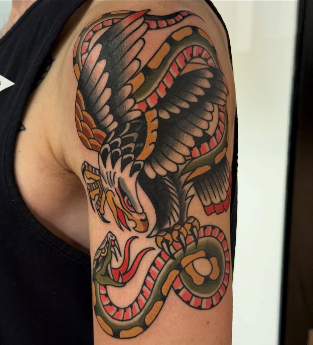 Bold traditional eagle and coiled snake, vibrant color blocking