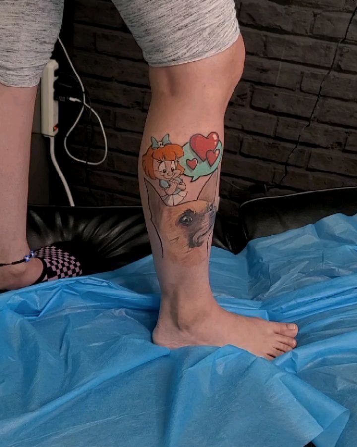 Whimsical memorial tattoo: cartoon girl with a heartfelt dog portrait