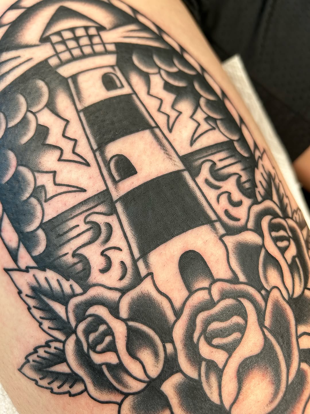 Bold blackwork castle panel with sculpted roses, dramatic