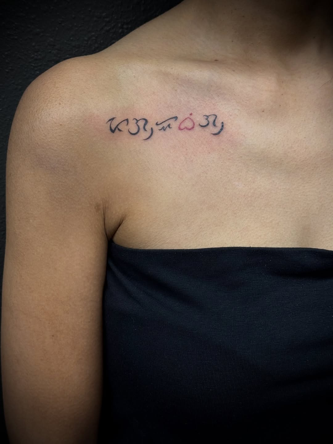 Fine-line Baybayin script spelling Pag-ibig with pink heart.