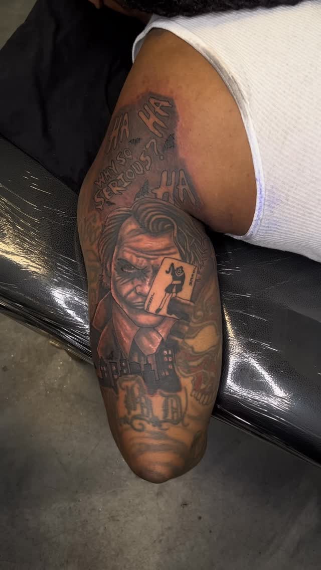 Monochrome sleeve with noir portrait, cityscape, and cards