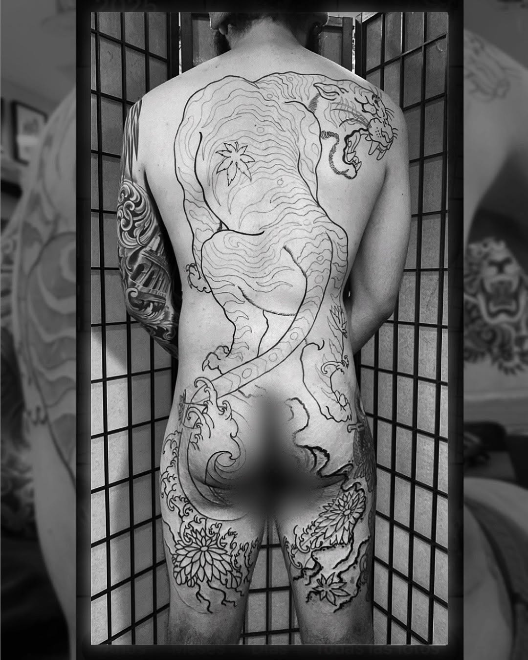 Massive back-piece dragon with flowing lines and florals