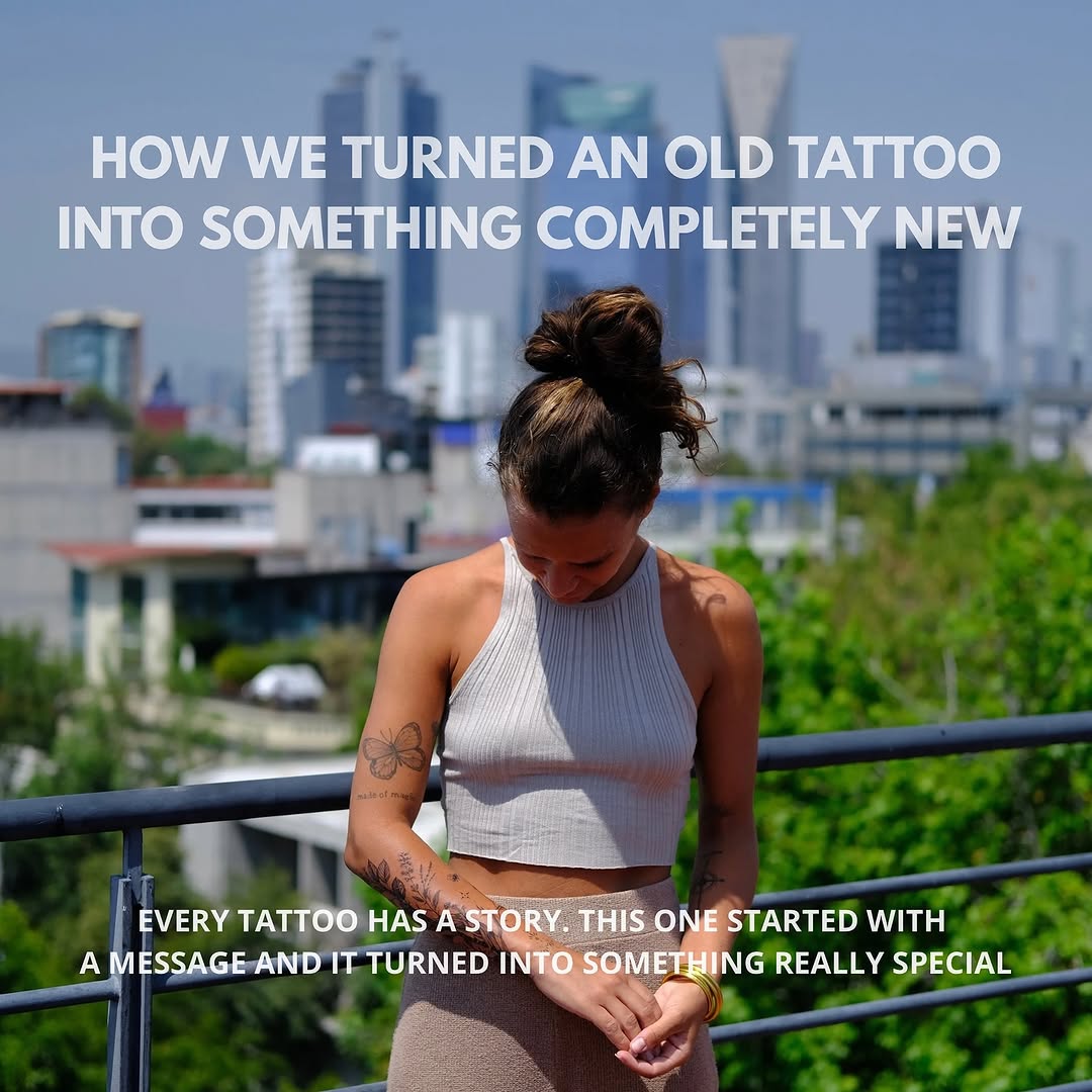 Delicate fineline botanical forearm with butterfly accent