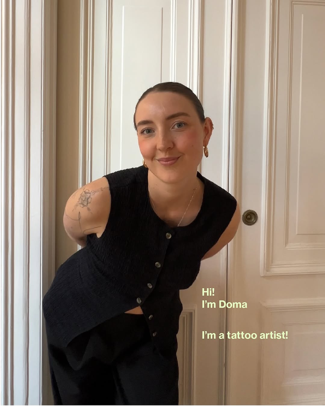 Delicate shoulder floral tattoo in fine-line style.