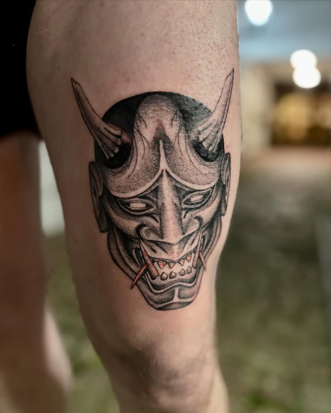 Bold horned demon mask with intense shading