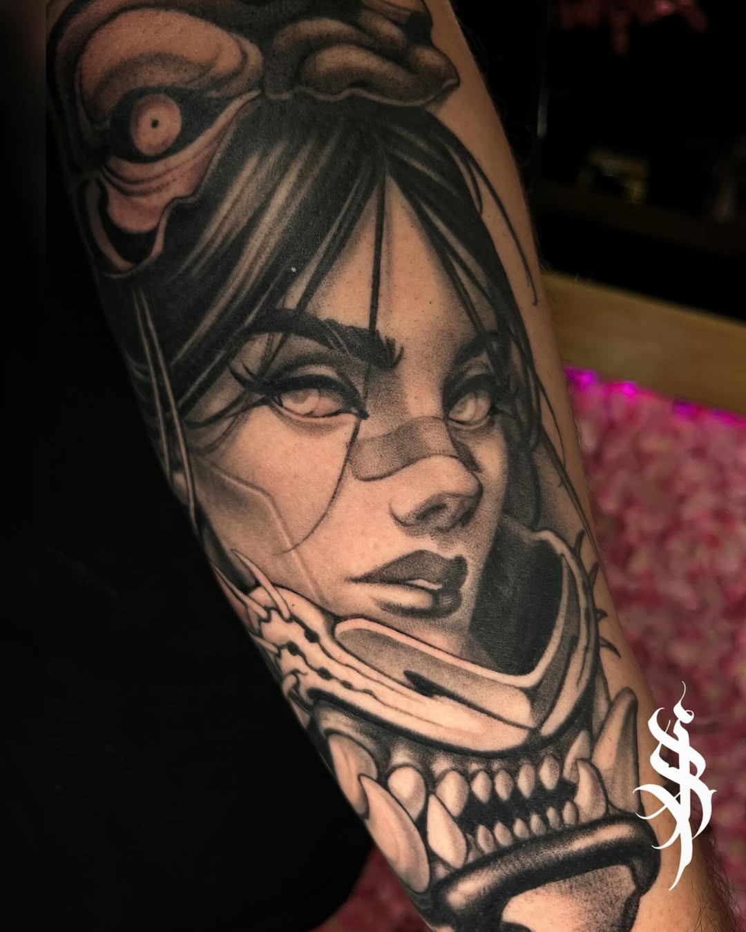 Monochrome skull-face portrait with bold linework and shading