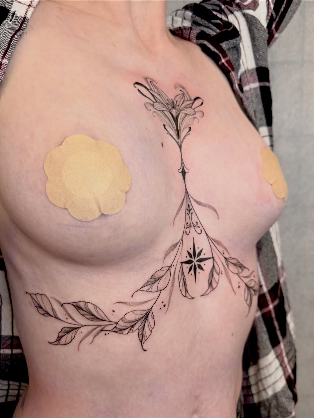 Intricate ornamental floral chestpiece with graceful linework