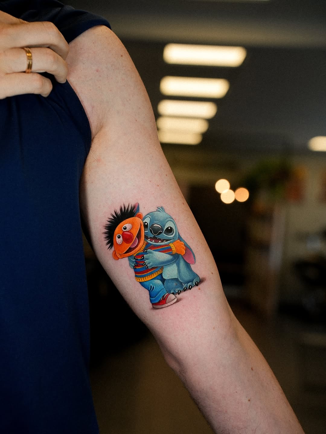 Colorful duo: Ernie and Stitch embrace in bold cartoon.