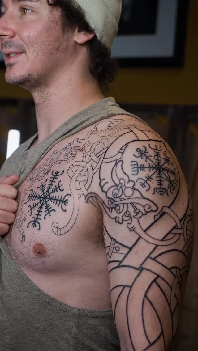 Bold Nordic knotwork sleeve with intricate linework