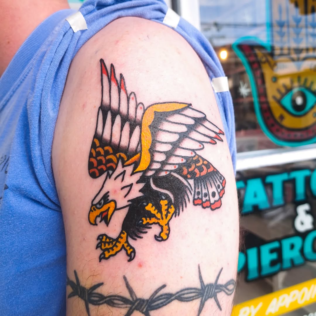 Eagle tattoo on upper arm