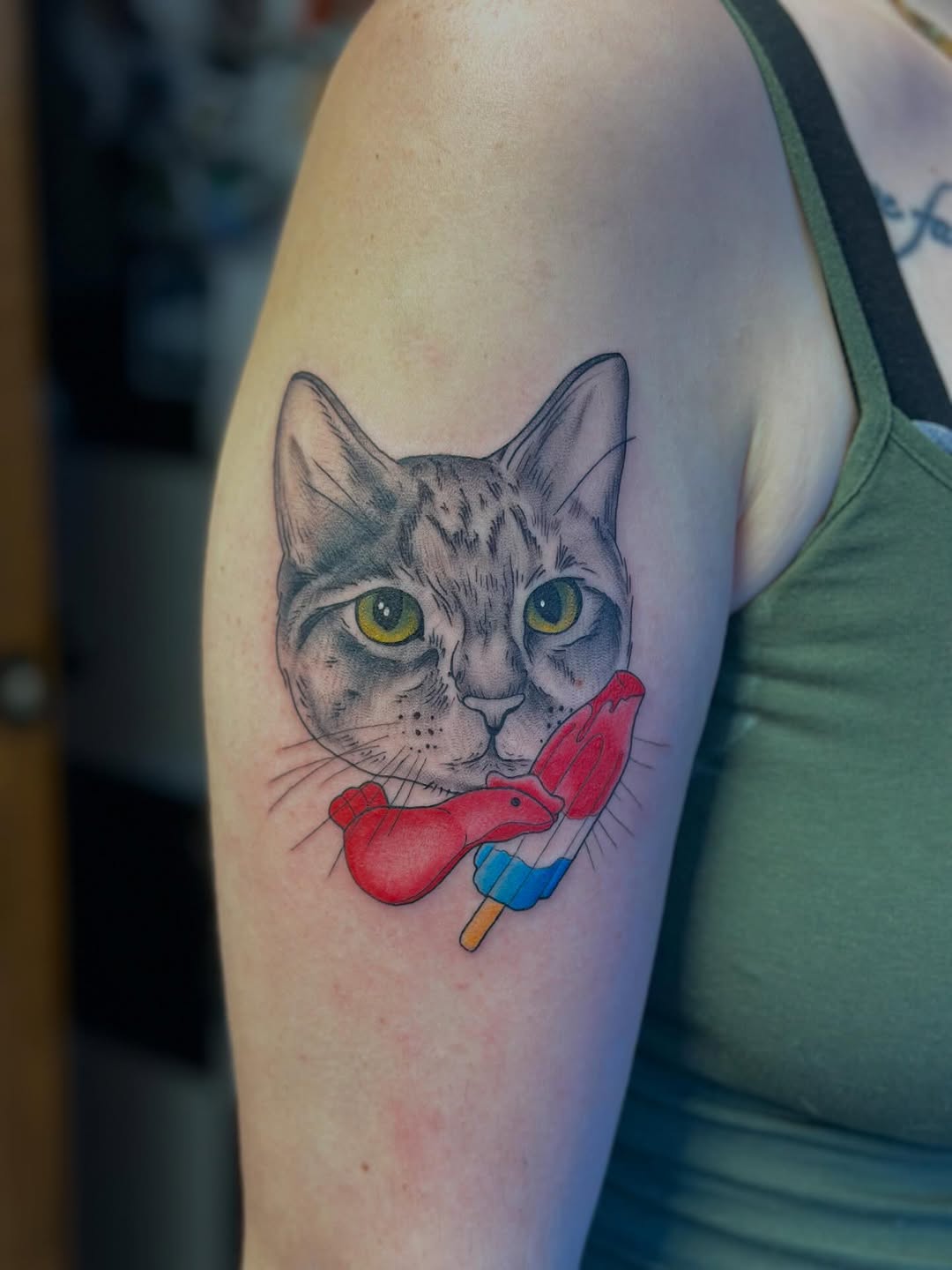 Playful cat portrait with bold linework and colorful popsicle