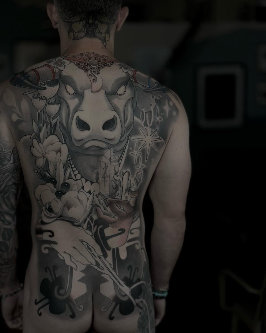 Massive back piece featuring pig head, florals, stars