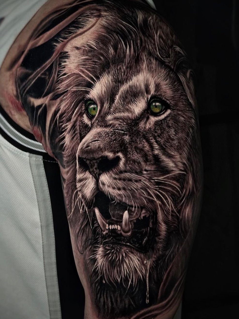 Realistic lion tattoo on arm