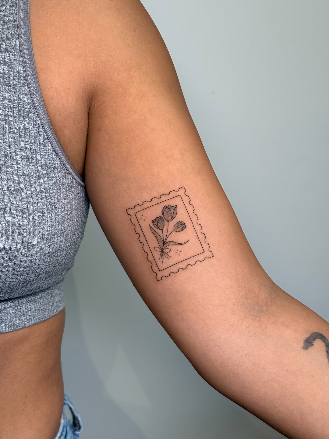 Delicate fine-line botanical frame with tulip blooms