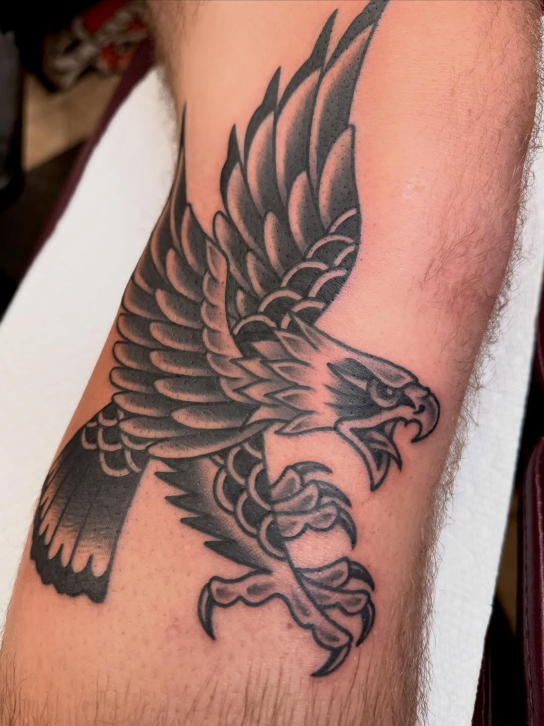 Eagle tattoo on knee