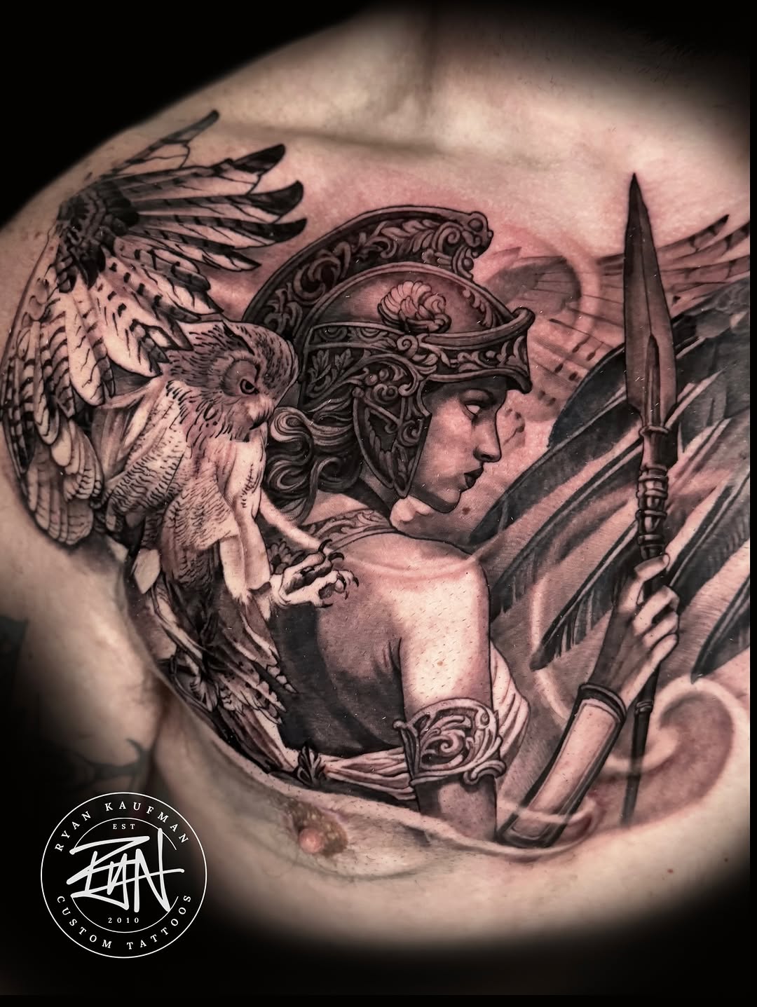Intricate black-and-gray Athena with wings and spear