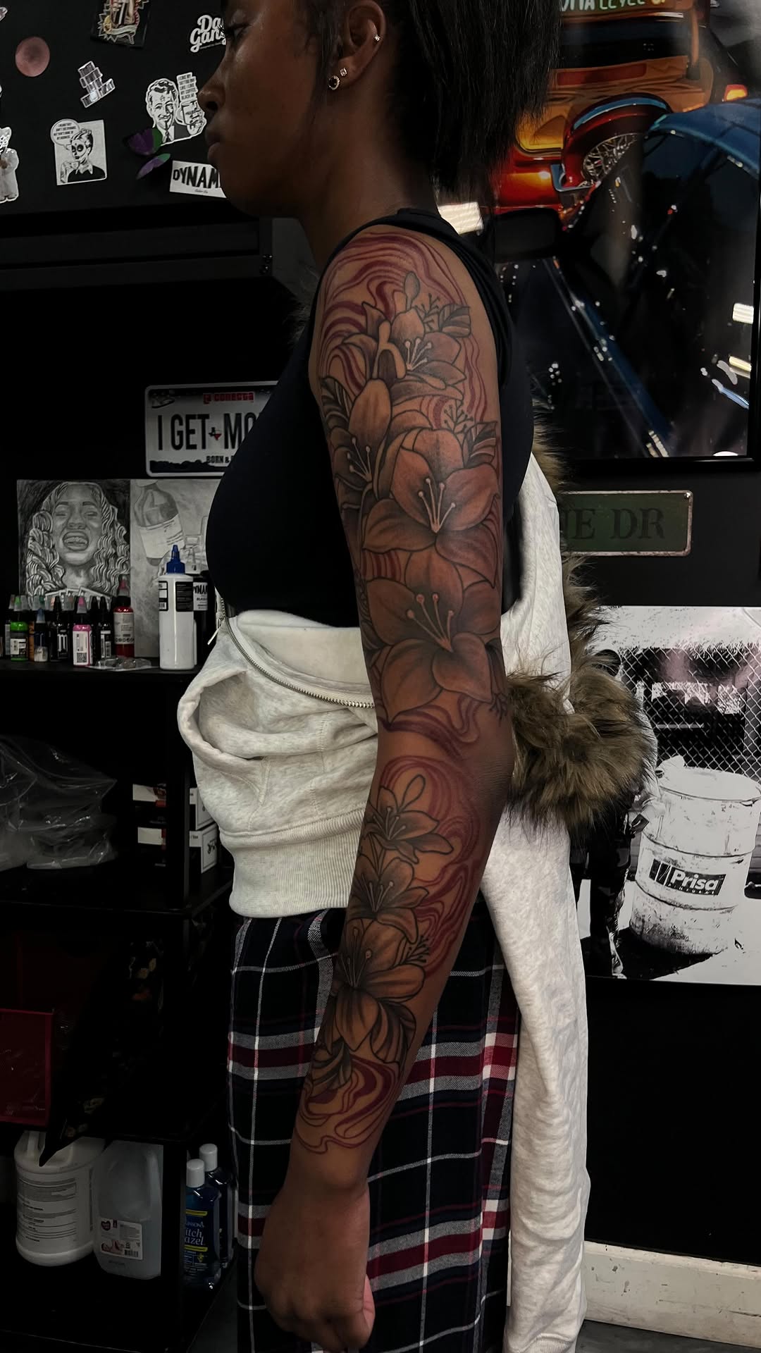 Intricate black-and-gray floral sleeve with bold linework and shading