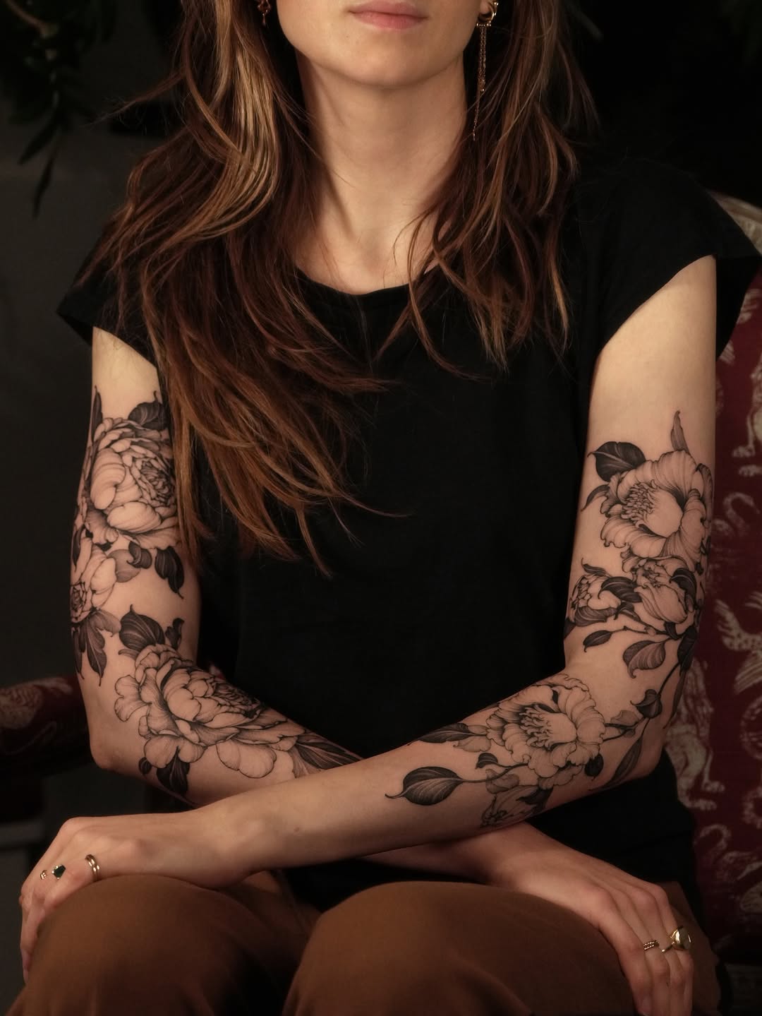 Intricate black-and-gray floral sleeves with peonies and buds