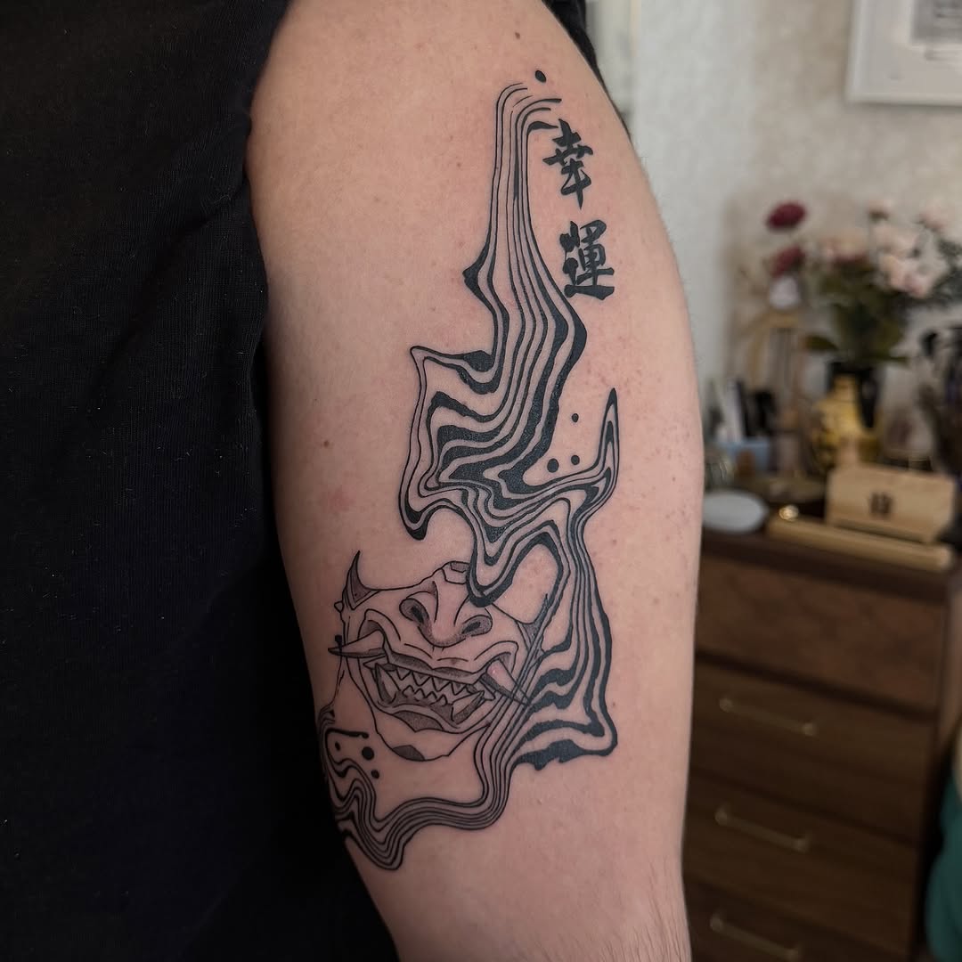 Abstract line-work with kanji and a ferocious demon motif