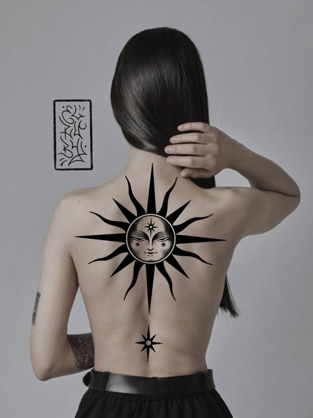 Bold black sunburst back piece with serene face