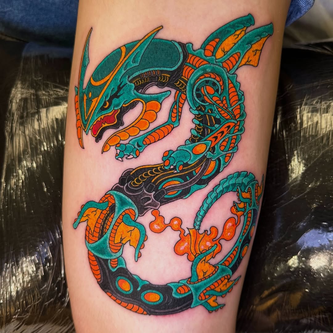 Vibrant turquoise dragon with orange accents, bold outlines