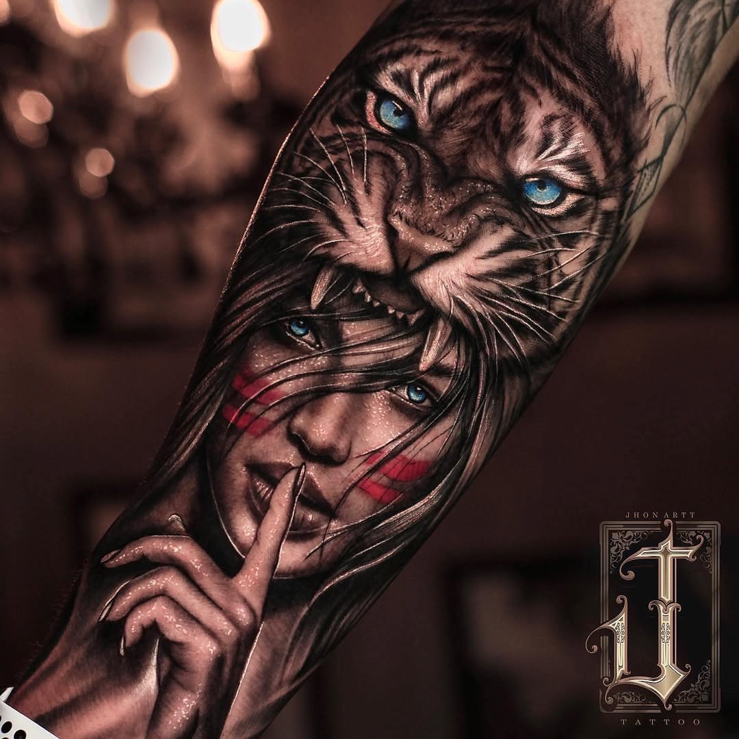 Hyper-realistic tiger and female portrait forearm piece.