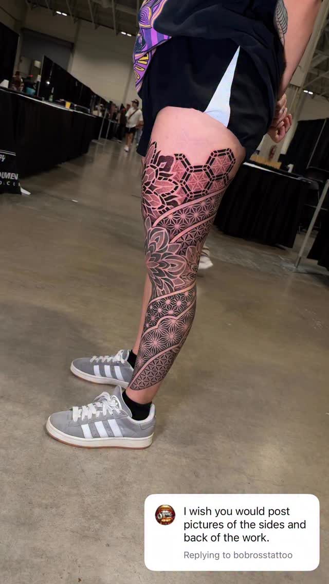 Geometric blackwork leg sleeve with mandala-inspired patterns.