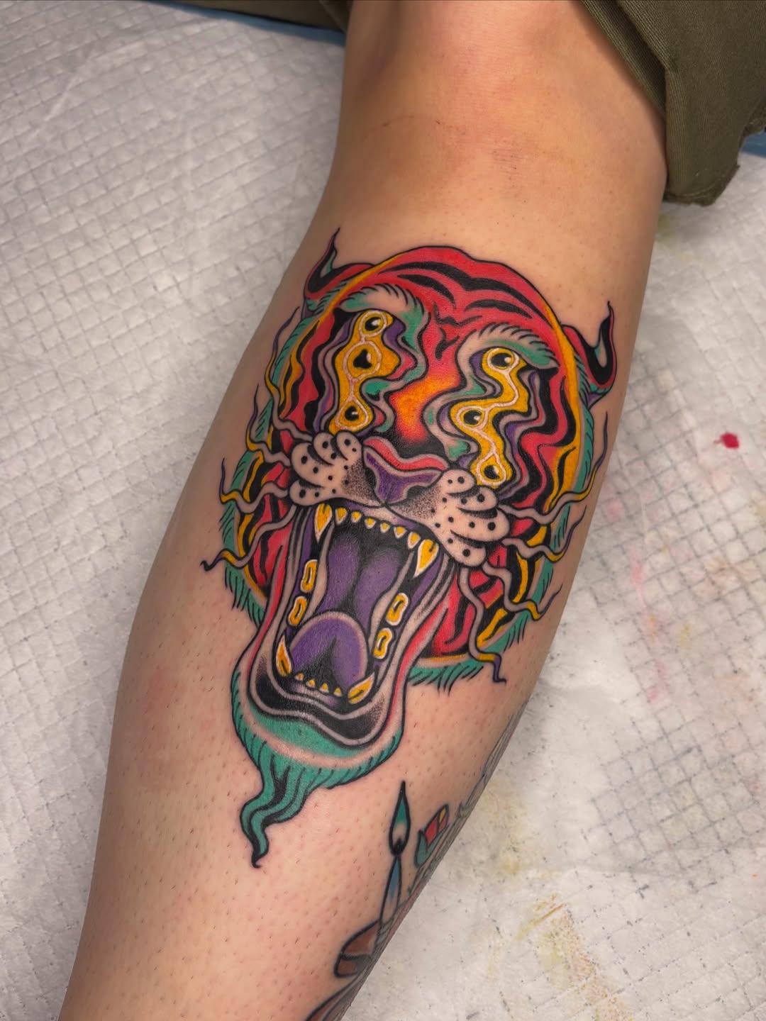 Vibrant neo-traditional tiger-demon head with neon swirls