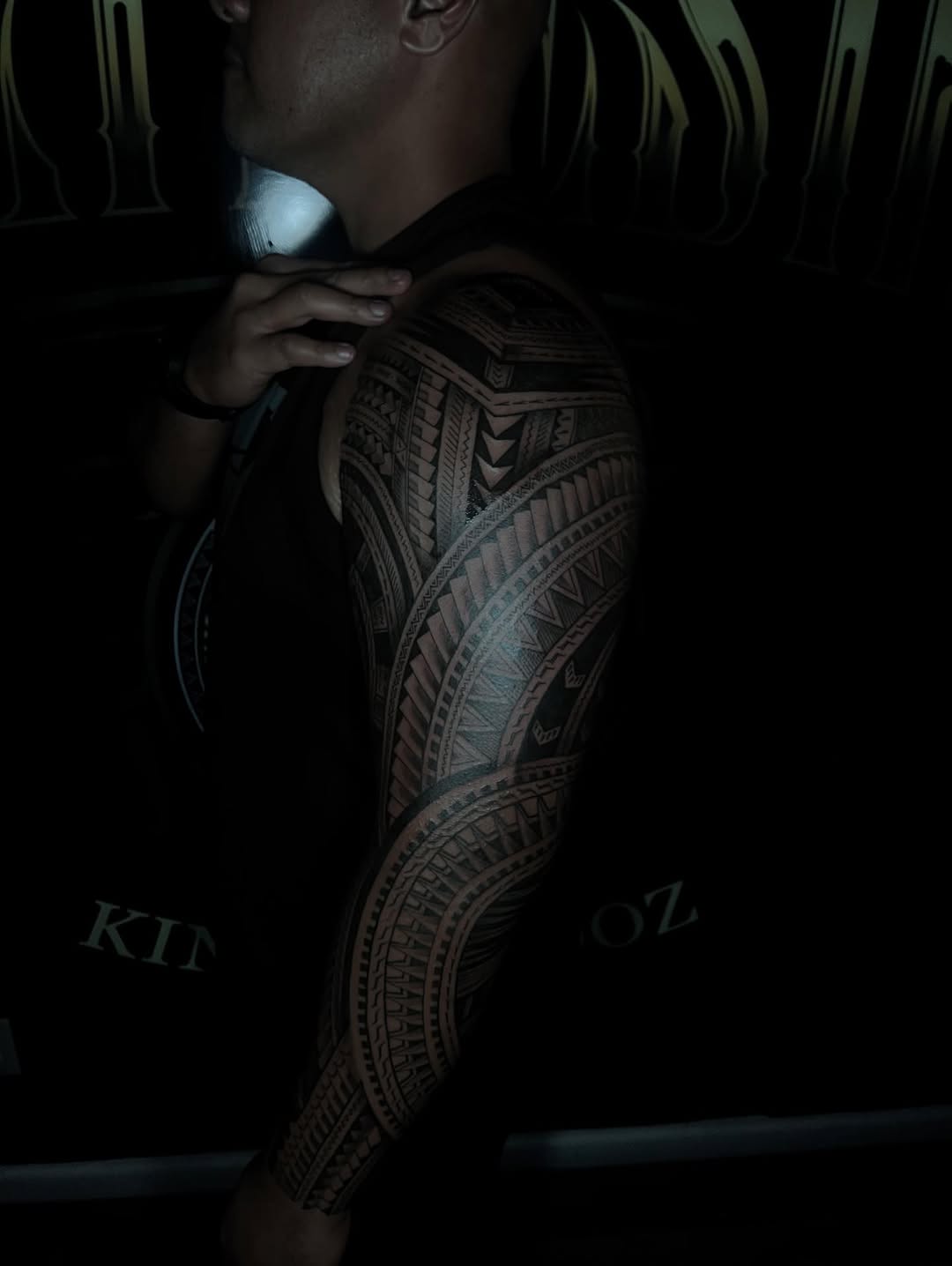 Massive Samoan ta tatau sleeve with geometric bands