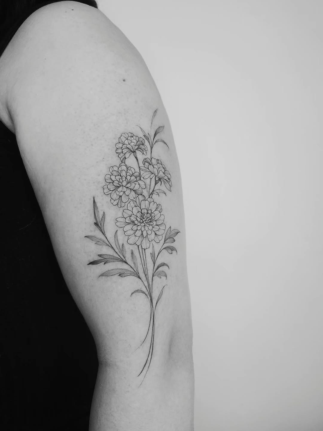 Marigold flower tattoo