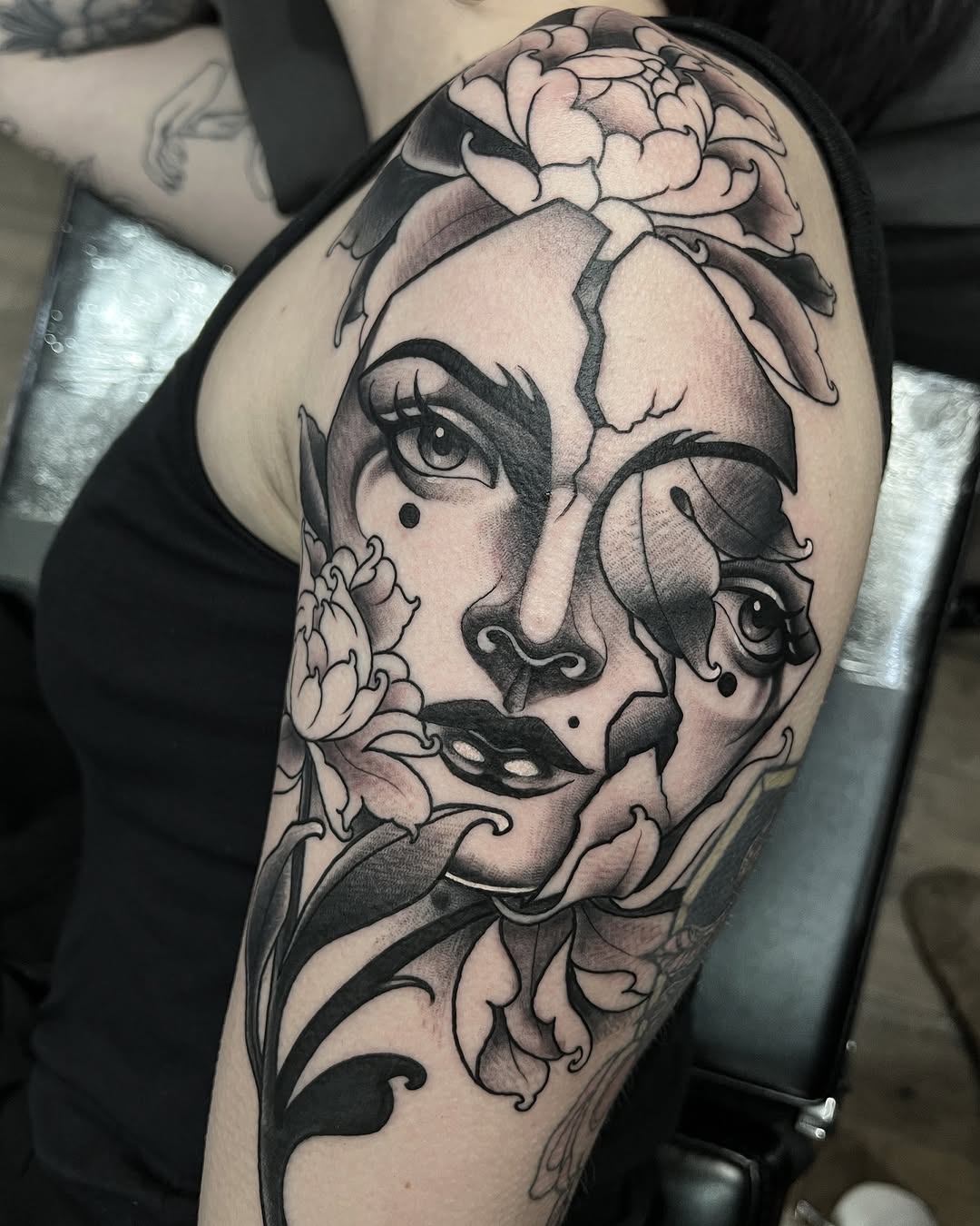 Bold neo-traditional portrait with flowing floral elements