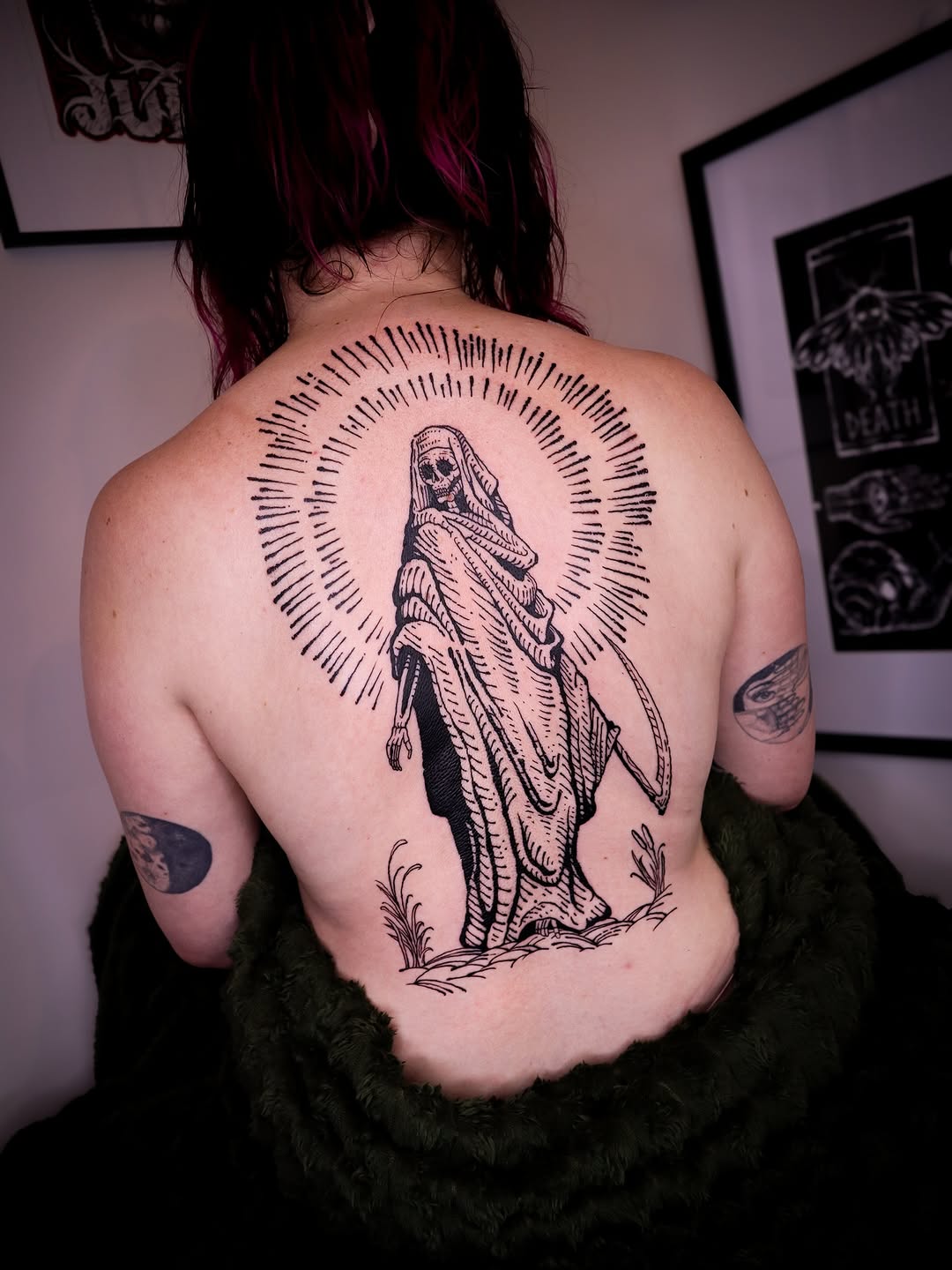 Bold back-piece: hooded grim reaper with radiant halo.