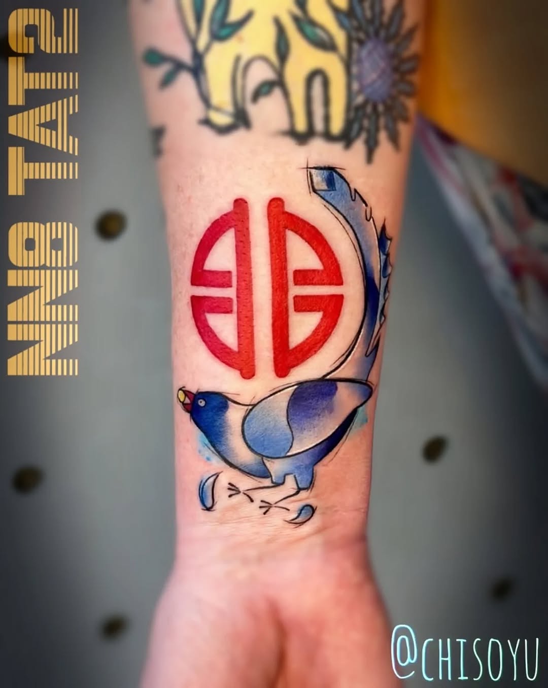 Vibrant Formosan blue magpie with bold red emblem, watercolor