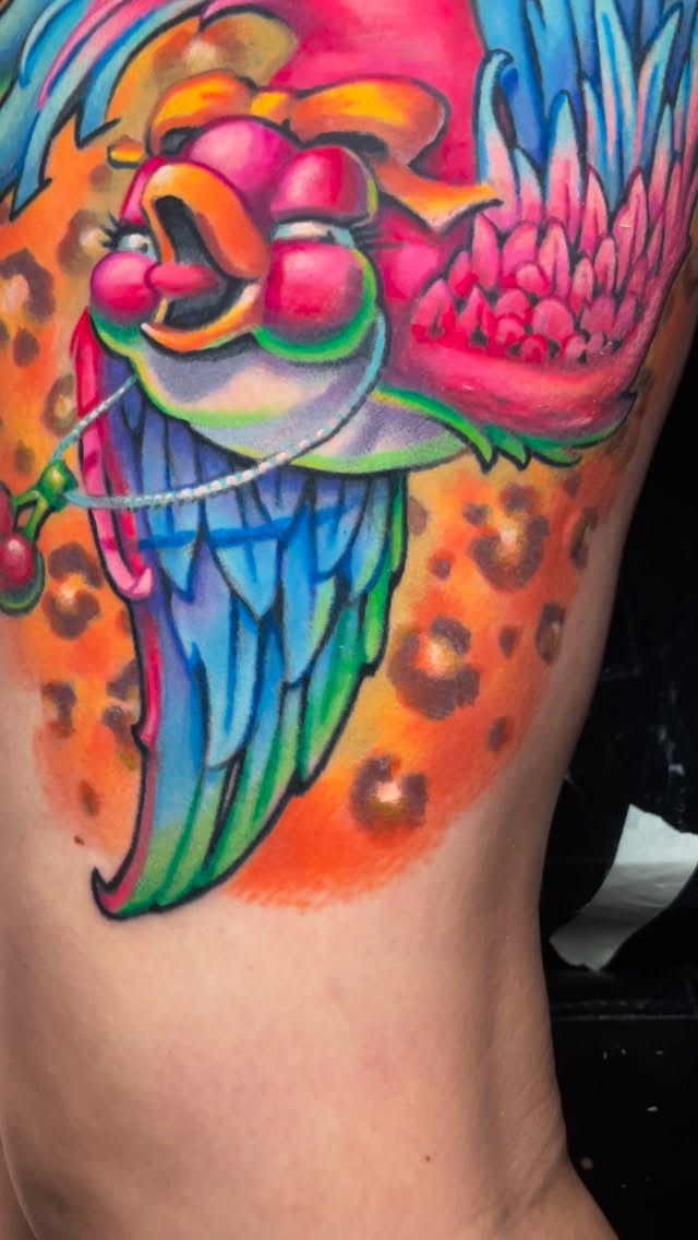 Vibrant rainbow parrot with bold, glossy feathers.