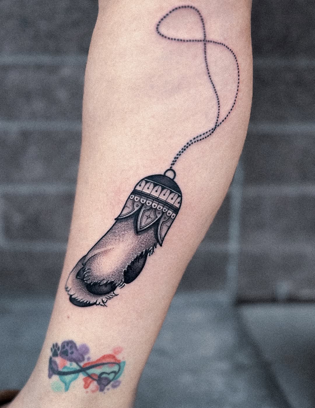 Delicate blackwork lantern pendant with dotted chain